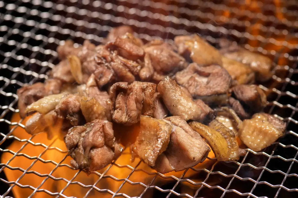 Hinai jidori on a grill.