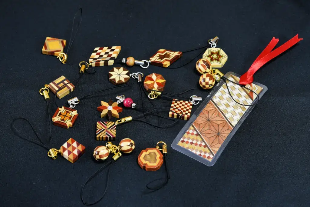 A bunch of marquetry jewelry.