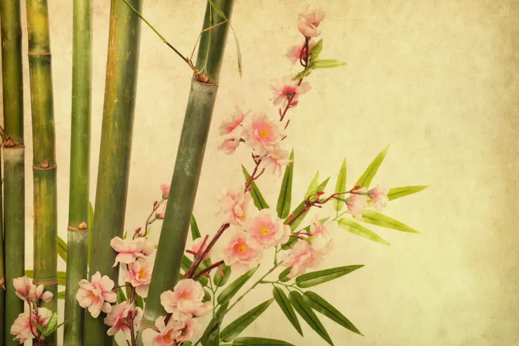 A Japanese painting of bamboo and flowers.