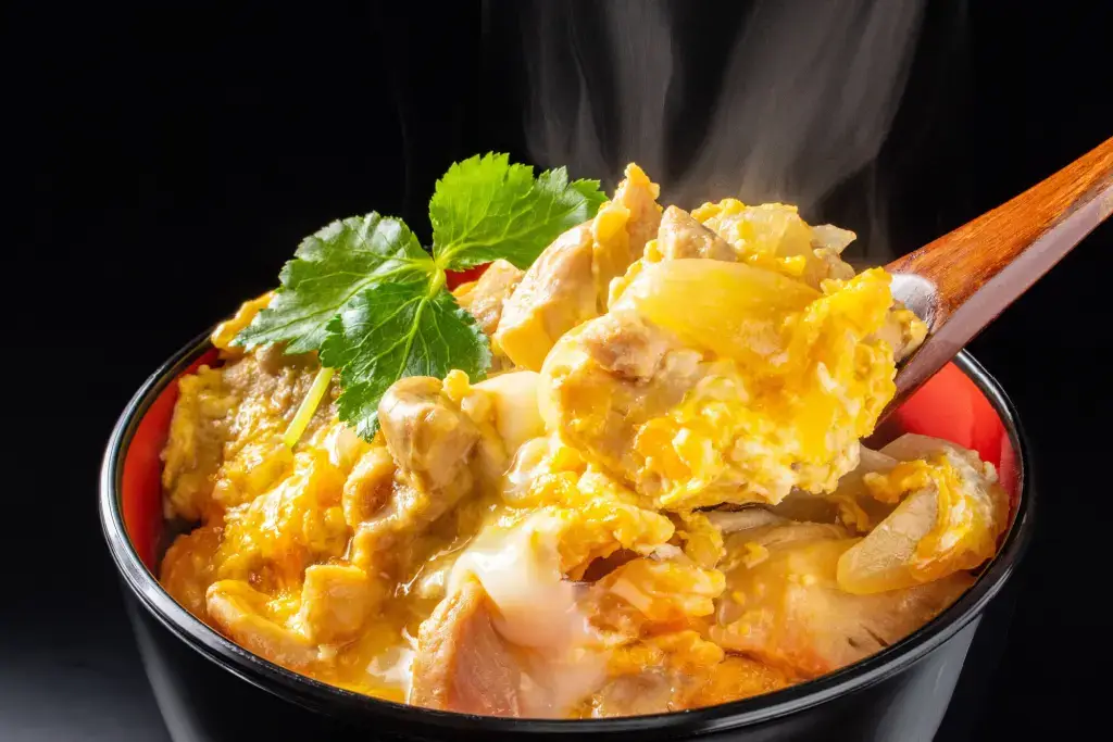 A bowl of oyakodon (simmered chicken and egg rice bowl).