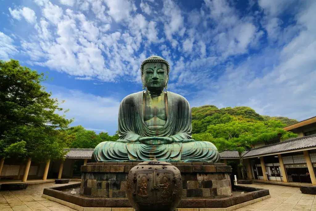 The large Buddha statue in Kamakura. It is seated.