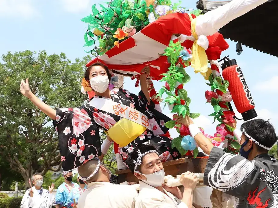 A woman wearing a yukata at the Aizen Festival.