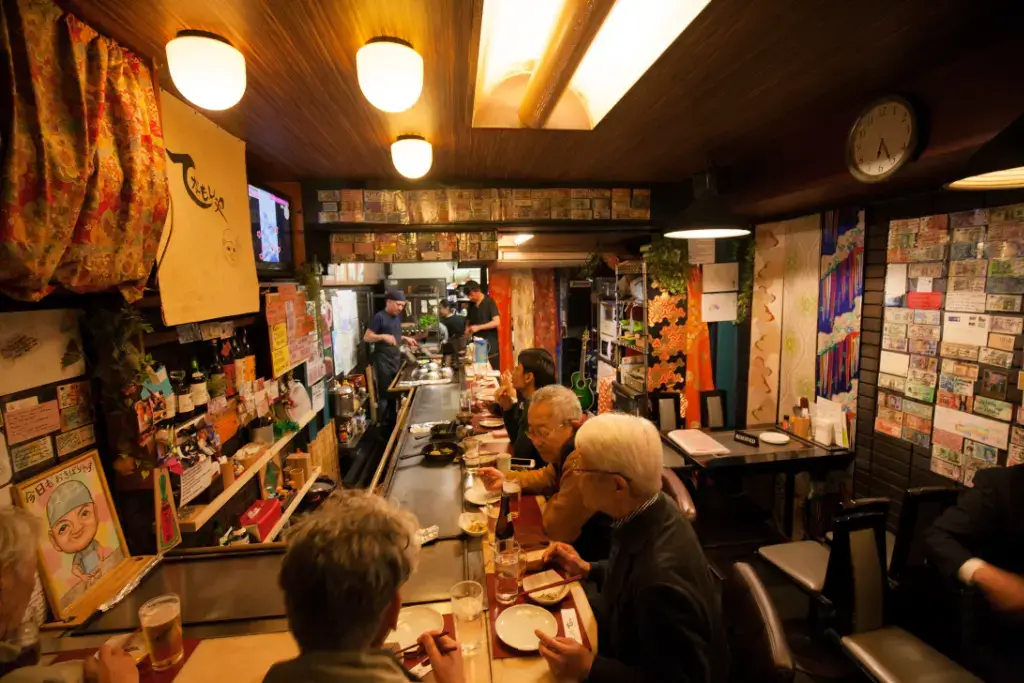 A crowded izakaya.