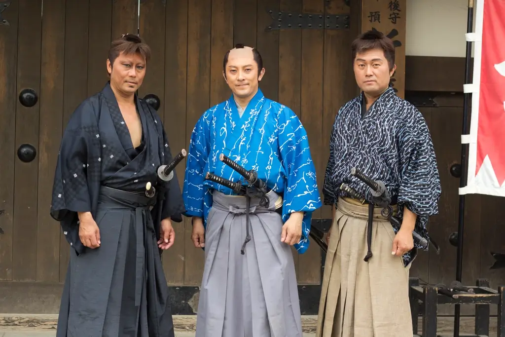 Three actors are in jidaigeki costume.