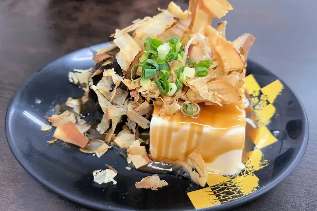 Tofu with katsuobushi on top.