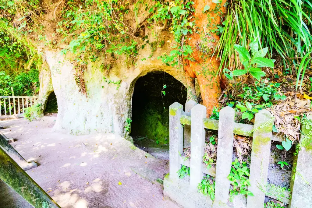 A walking path and white fence in Shiroyama Park, Kagoshima, formerly the Satsuma Province.