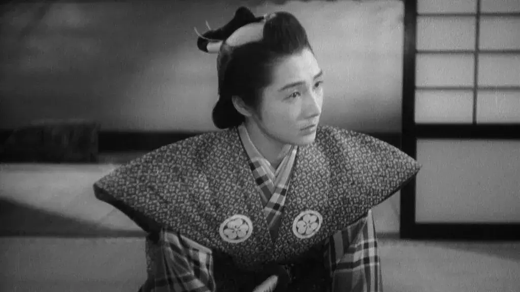 A shot from The 47 Ronin (1941). It's in black-and-white and shows a young page in traditional garb.
