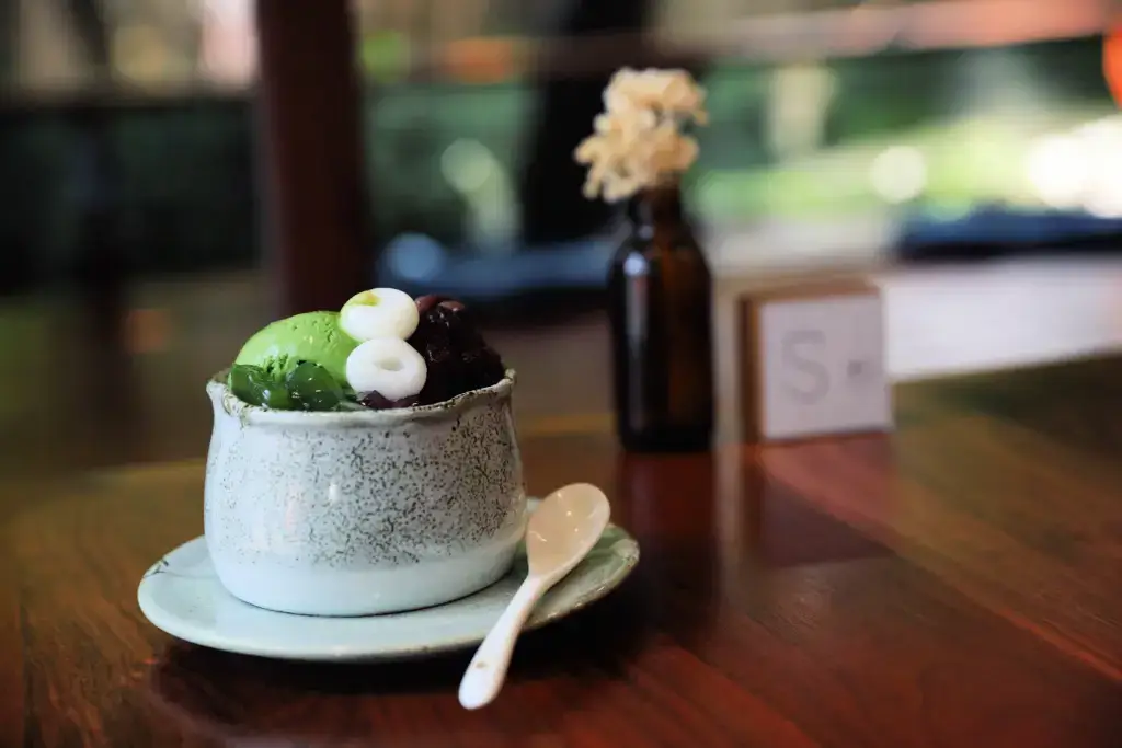 A bowl of anmitsu featuring matcha ice cream.