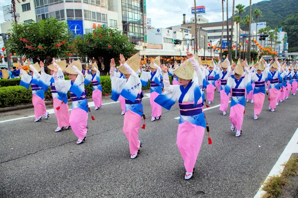 A bunch of female dancers in tradiitonal clothing at the Awa Dori event.