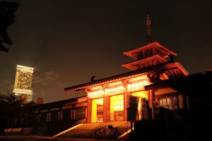 An illuminated temple in Japan during Obon.
