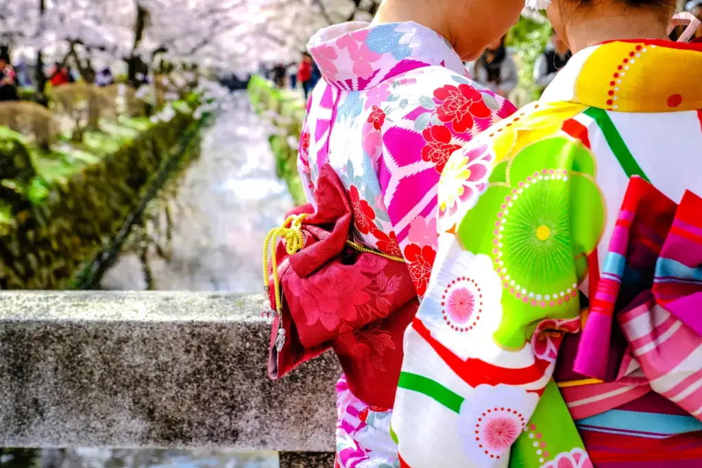 A close up of a pink and green summer kimono.