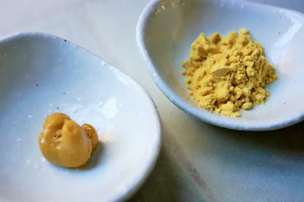 A bowl of karashi powder and arashi mustard.