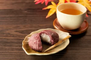 A plate of red bean paste covering ohagi.