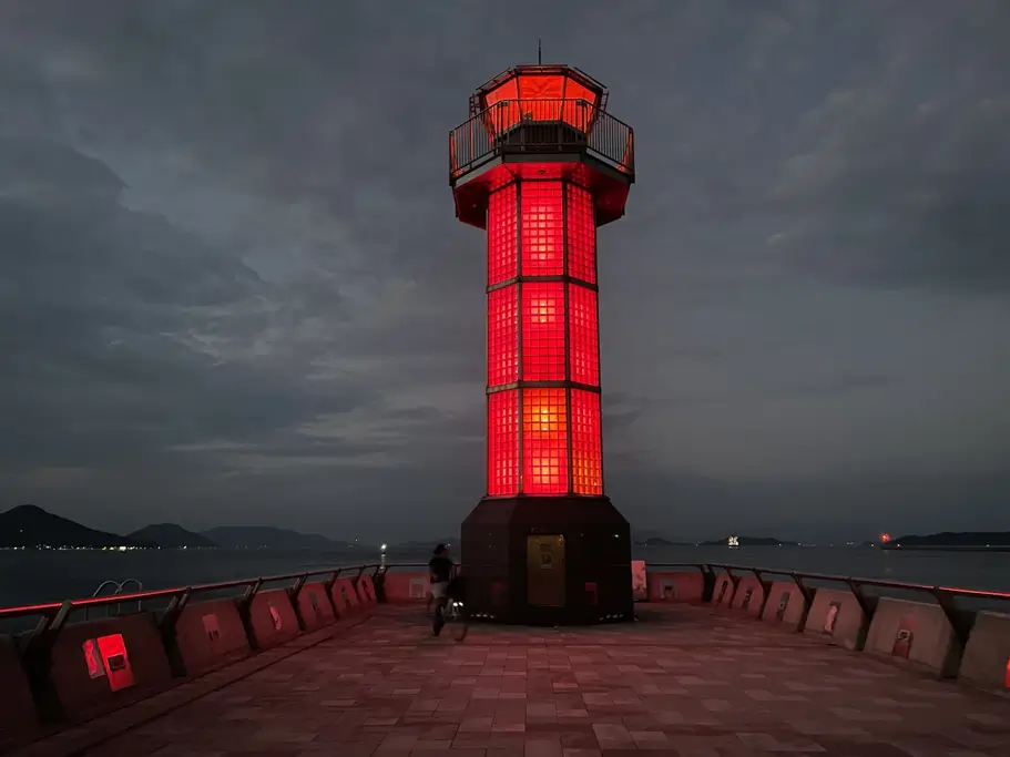 Takamatsu Red Lighthouse at night.