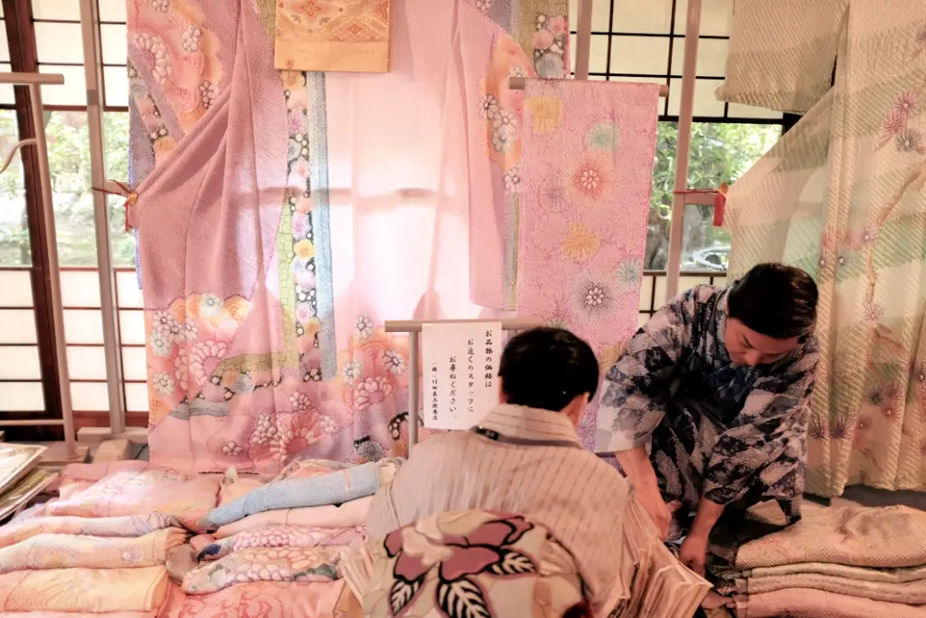 Two people making a kimono in Aichi Prefecture.