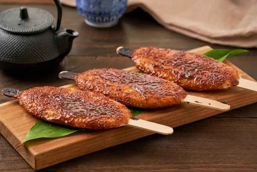 Three sticks of gohei mochi.