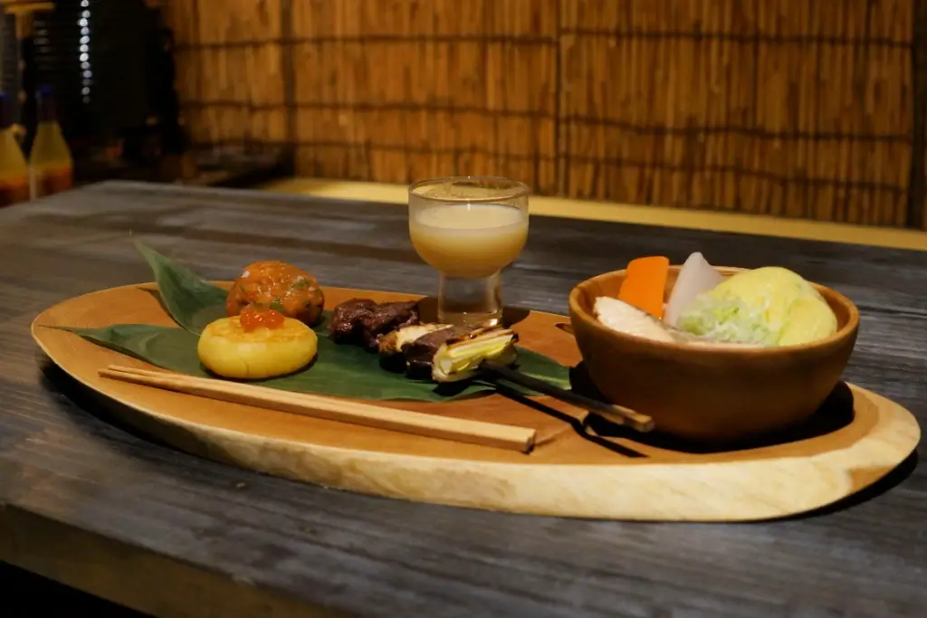 A platter of Ainu cuisine on a table.