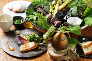 A platter of Ainu cuisine from the HARU RAN NA Open Flame Dining and Cafe at the Upoypoy Museum in Shiraoi Town, Hokkaido.