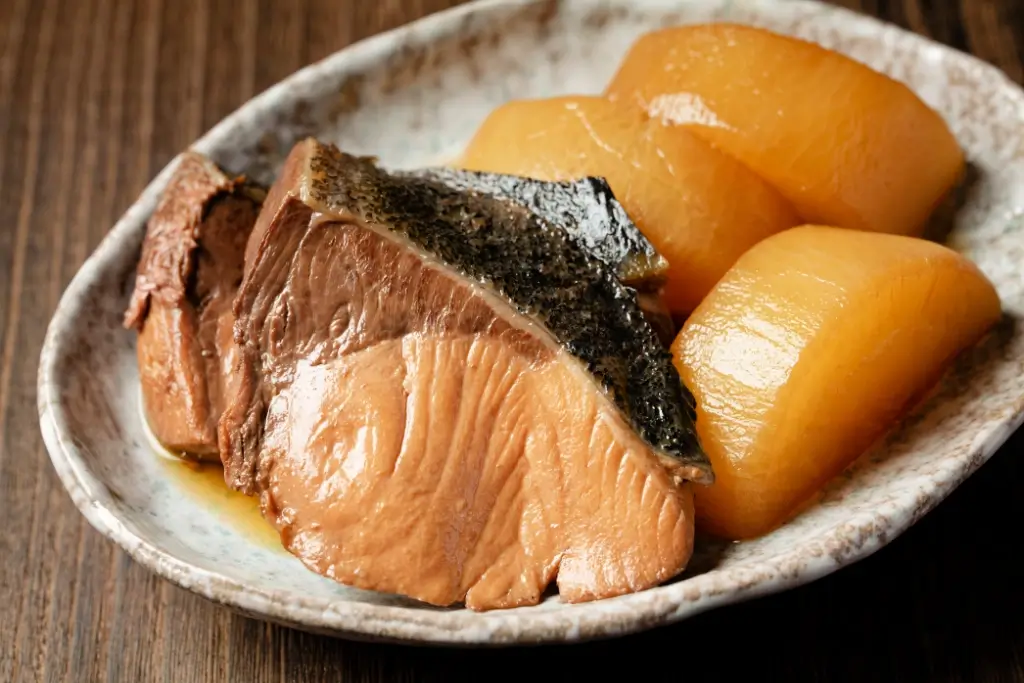 A plate of buri daikon (simmered yellowtail and radish).