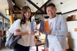 Sakuraco’s CEO, Ayumi Chikamoto, stands with Iwazumi’s current president Takehiro. Iwazumi makes snacks from sweet potatoes.