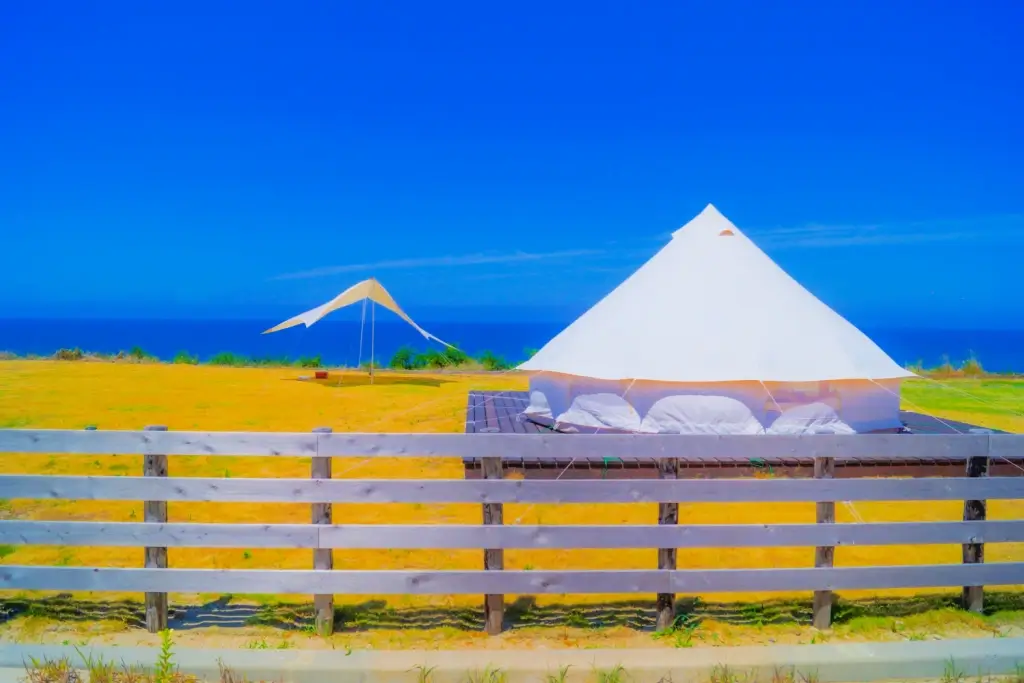 A big white tent under a blue sky in Niigata.