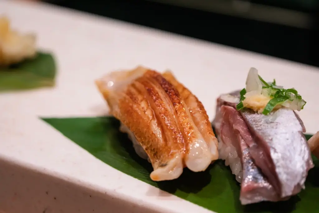 A plate of nodoguro sushi.