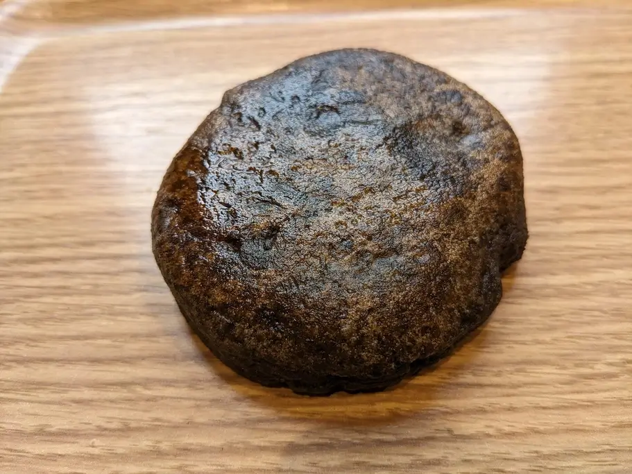 A dark potato dumpling or a pocche imo.