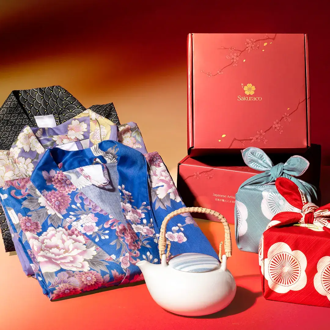 Sakuraco campaign items: Three different kimonos, a white teapot, a furoshiki-wrapped box, and a white teapot.