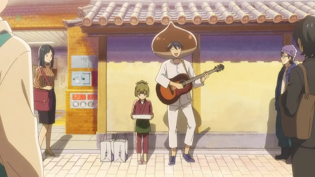 A man and a child busking in a street from "Deaimon". The man is wearing a chestnut hat.