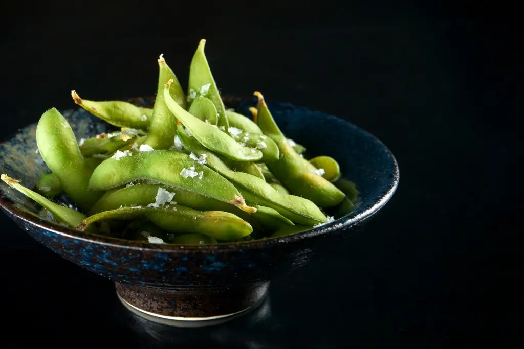 A bowl of young green soybeans.