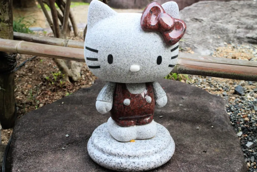 A stone statue of Hello Kitty.