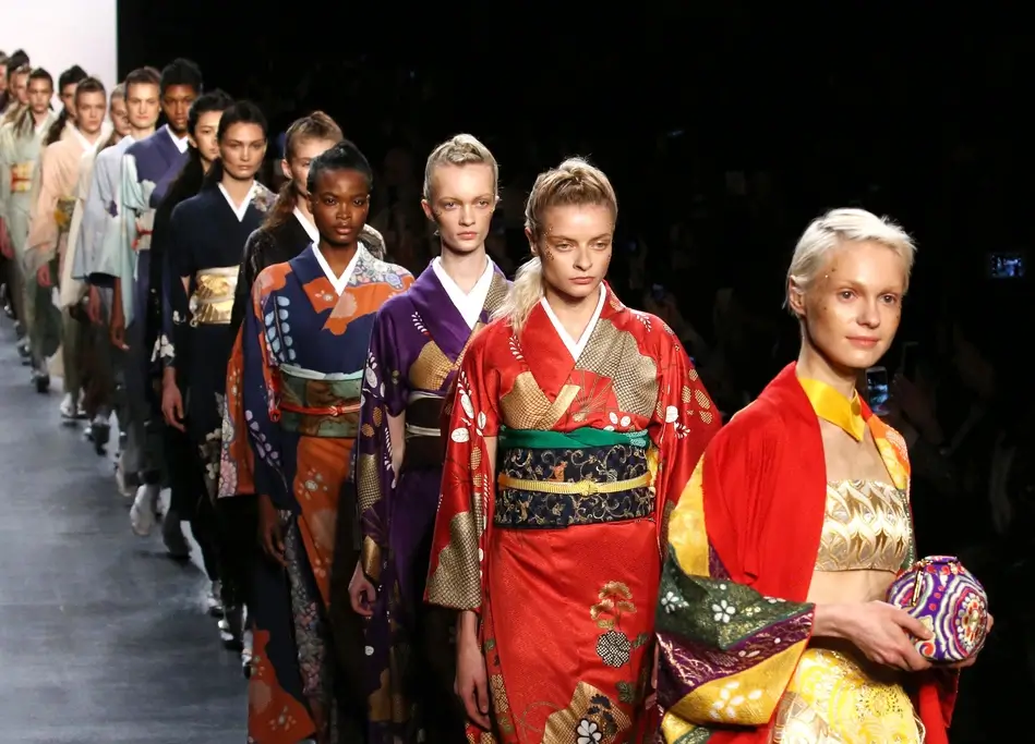 A bunch of models wearing kimonos by Hiromi Asai