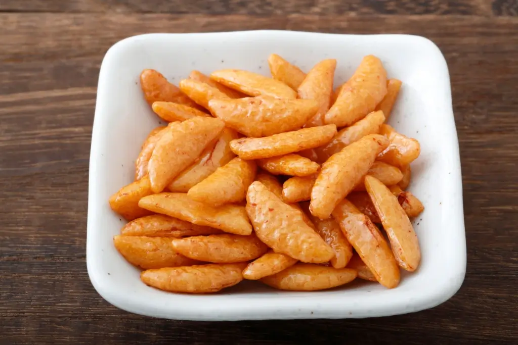 A plate of persimmon-shaped rice crackers.