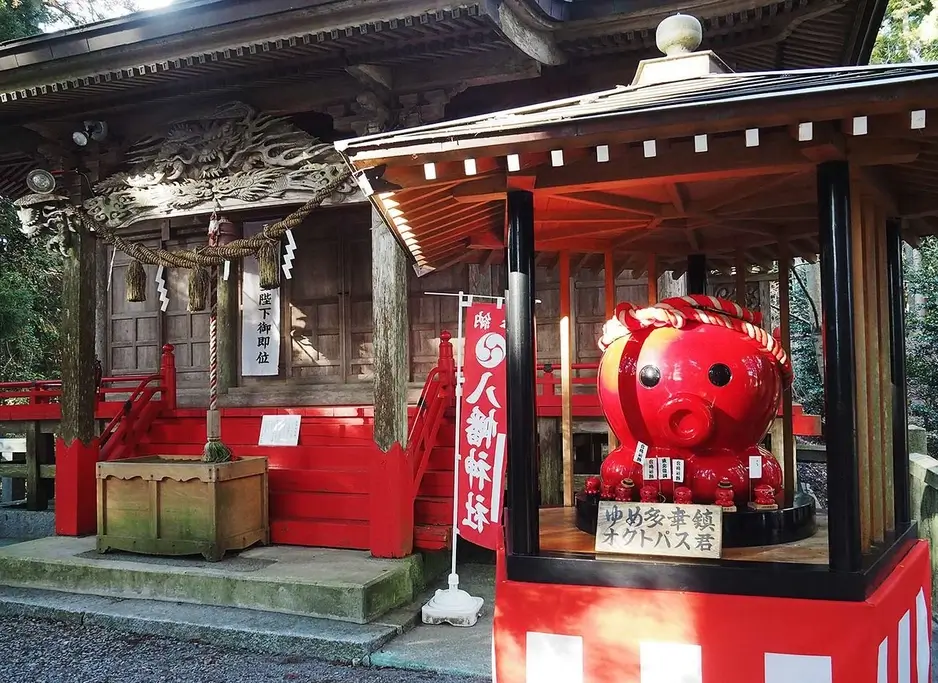 Octopus-kun (cartoonish red octopus mascot) at Iriya Hachiman Shrine.