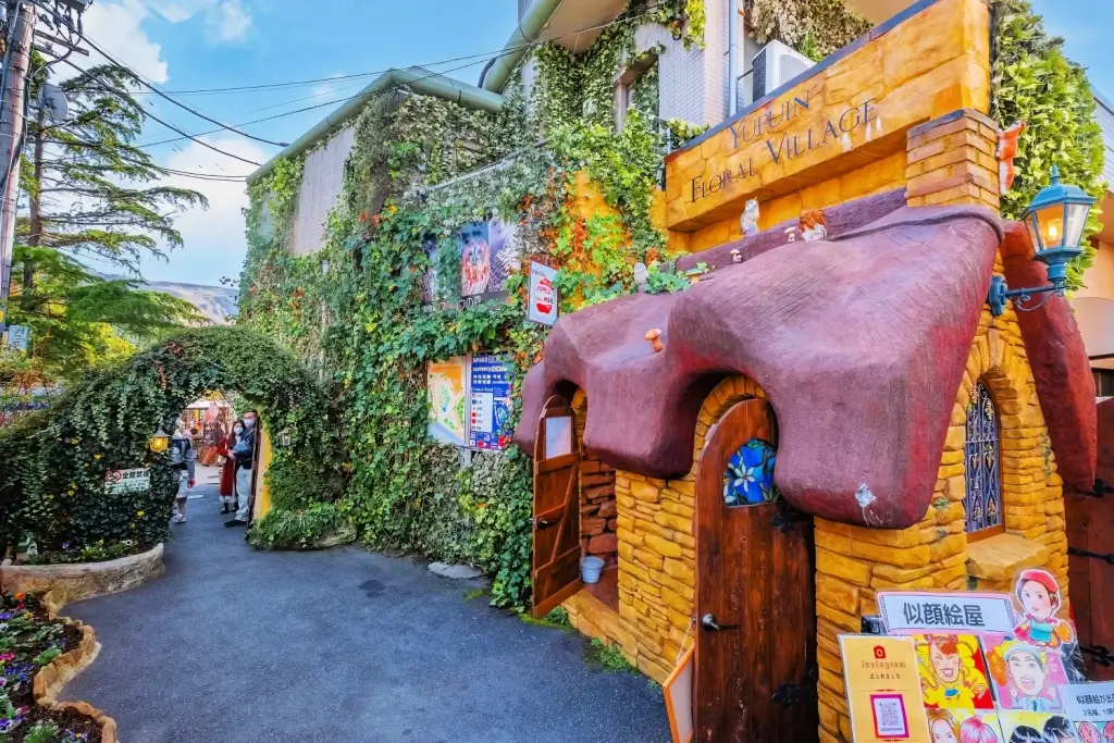 Yufuin Flower Village in Oita Prefecture. It has a bunch of quaint yellow houses.