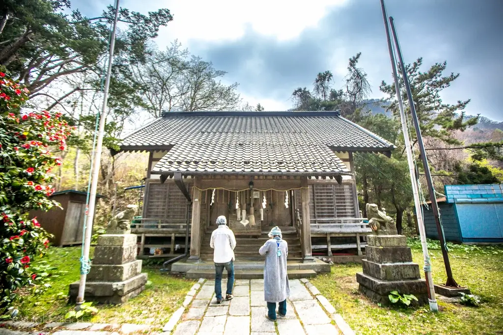 People visiting Sumiyoshi Shrine in Hokkaido.