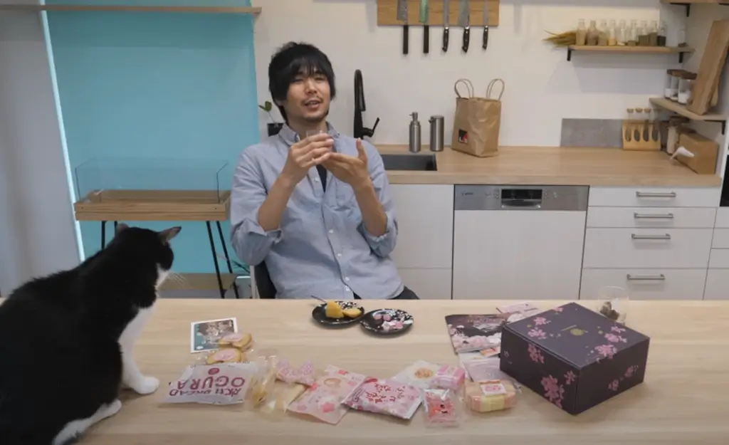 Jun from Jun's Kitchen relaxing with his Sakuraco box after factory tour.