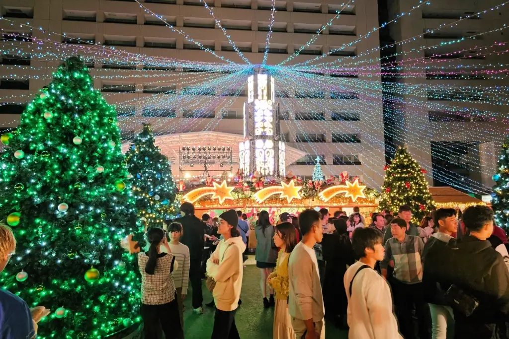 A group of people at an event during Christmas in Japan.