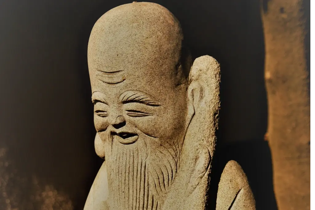 A statue of Fukurokuju. He's an old man with a long head.