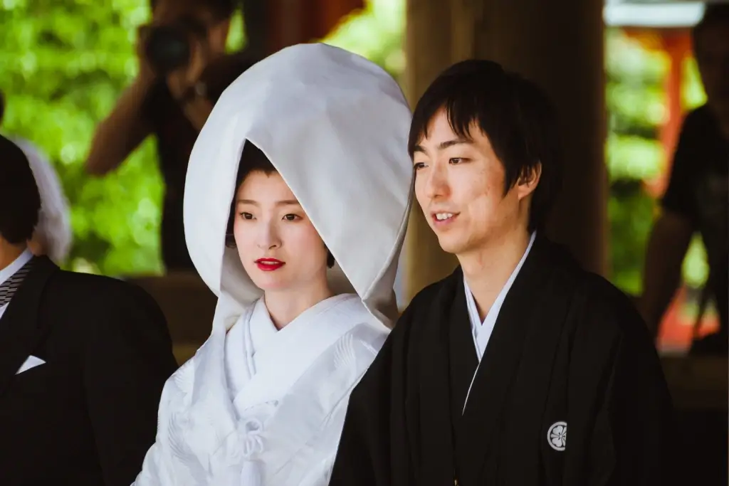 A bride and groom at a Japanese wedding.