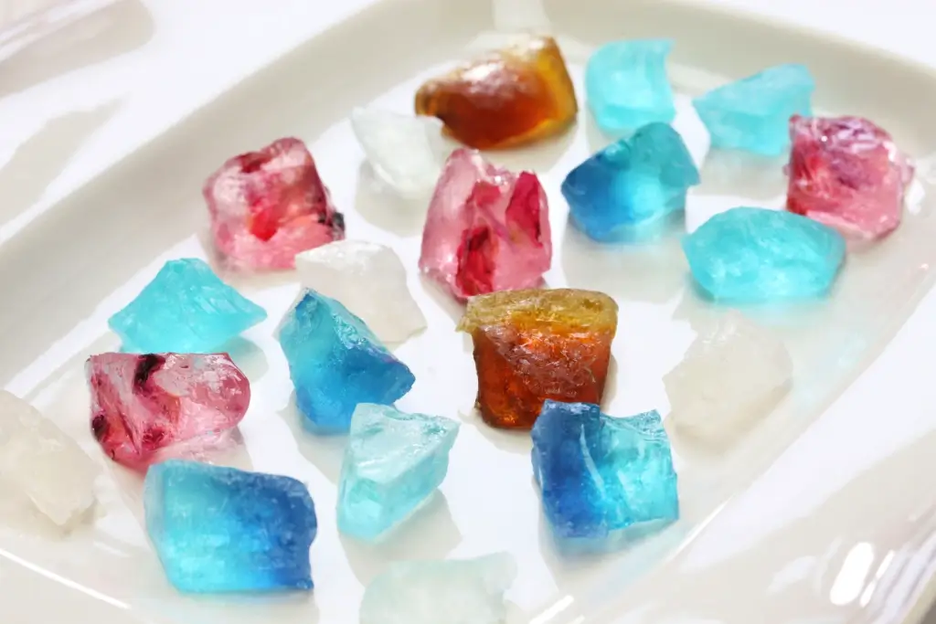 A plate of blue, brown, red and clear kohakutou.