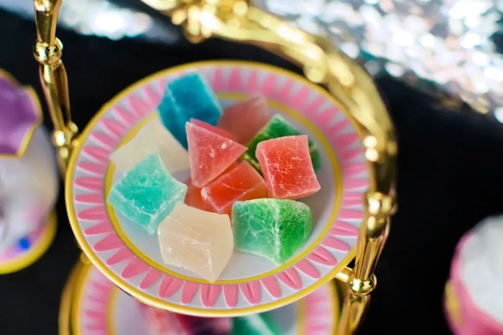 A plate of crystal jelly candy on a tiered tray.