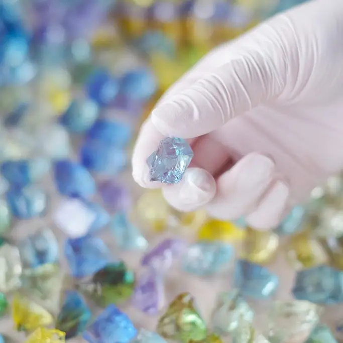 A person from Mahou no Kohakotou holding a crystal jelly.