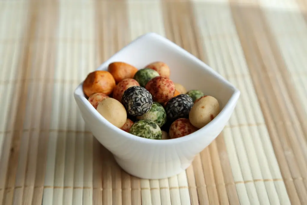 A bowl of mamegashi, similar to Japanese peanuts, in a bowl.