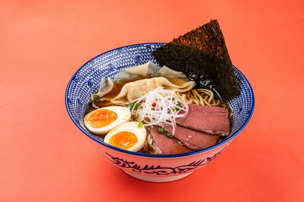 A bowl of pastrami ramen.