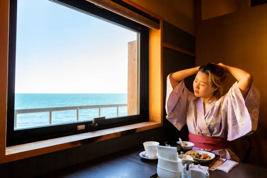 A woman relaxing at one of many hotels in Japan.