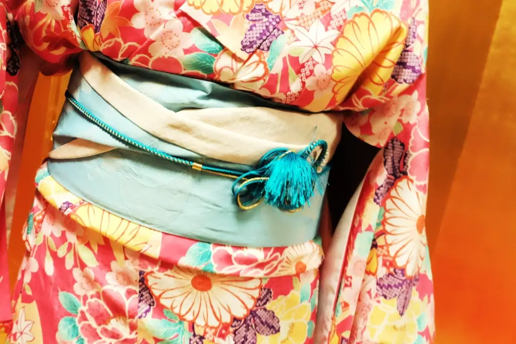 An obi made of multiple Japanese fabrics.