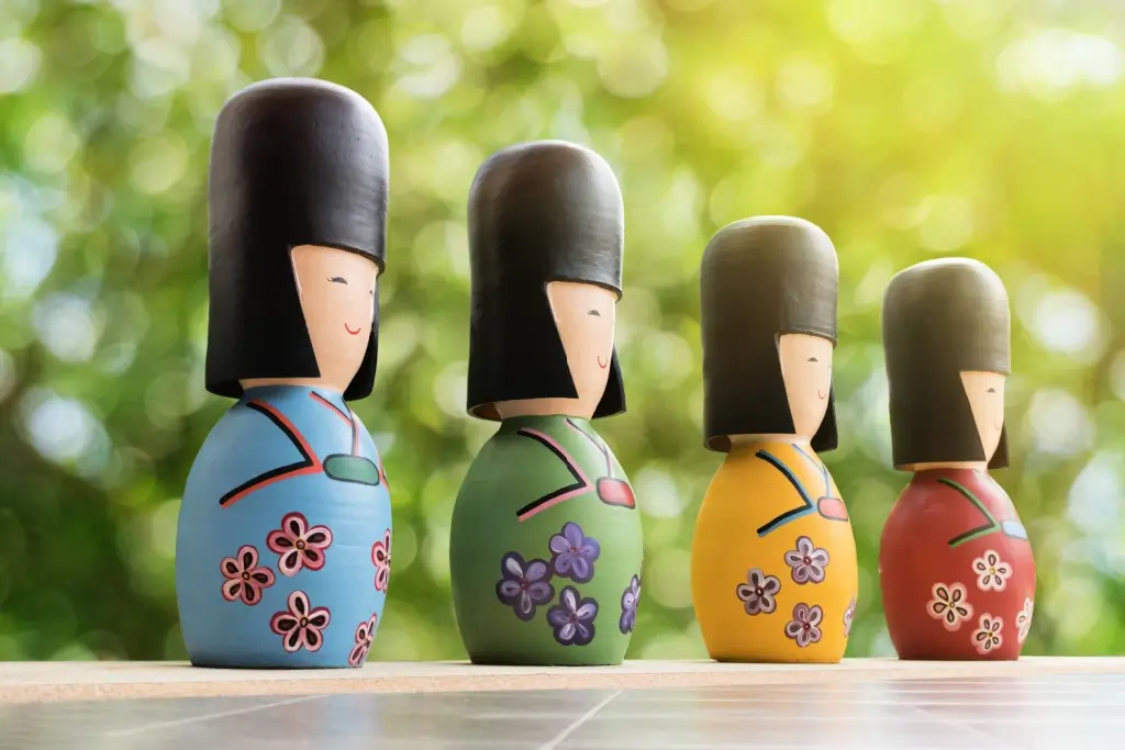 A collection of colorful Japanese wooden dolls.