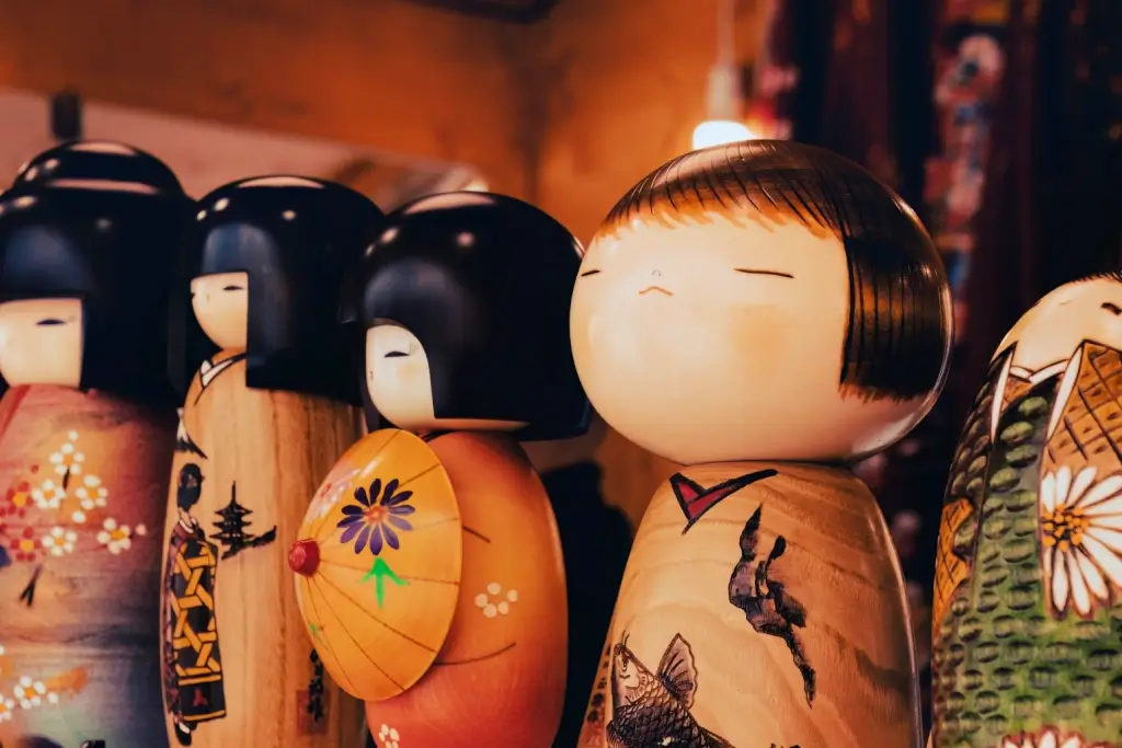 A collection of kokeshi dolls.