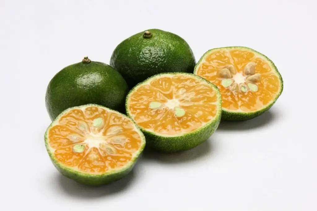 Cross-sections of shikuwasa citrus fruit.